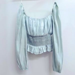 Light blue shiny top